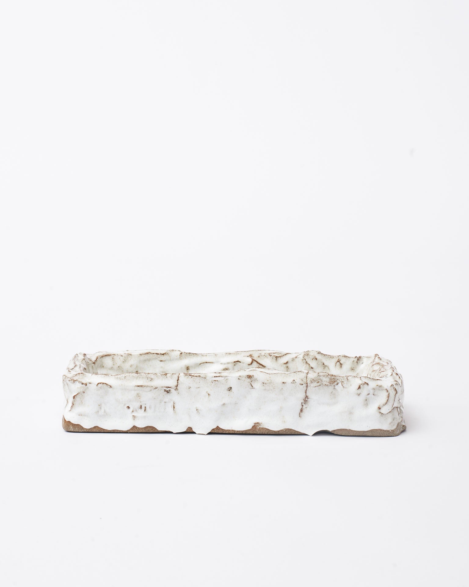 Handmade ceramic organizer object white in white background